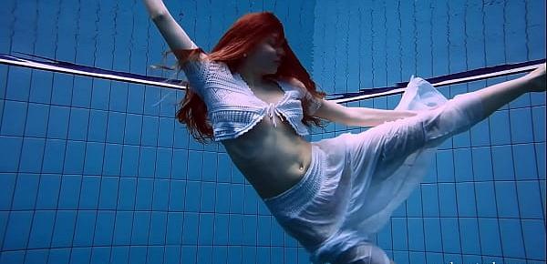  Redhead Marketa in a white dress in the pool